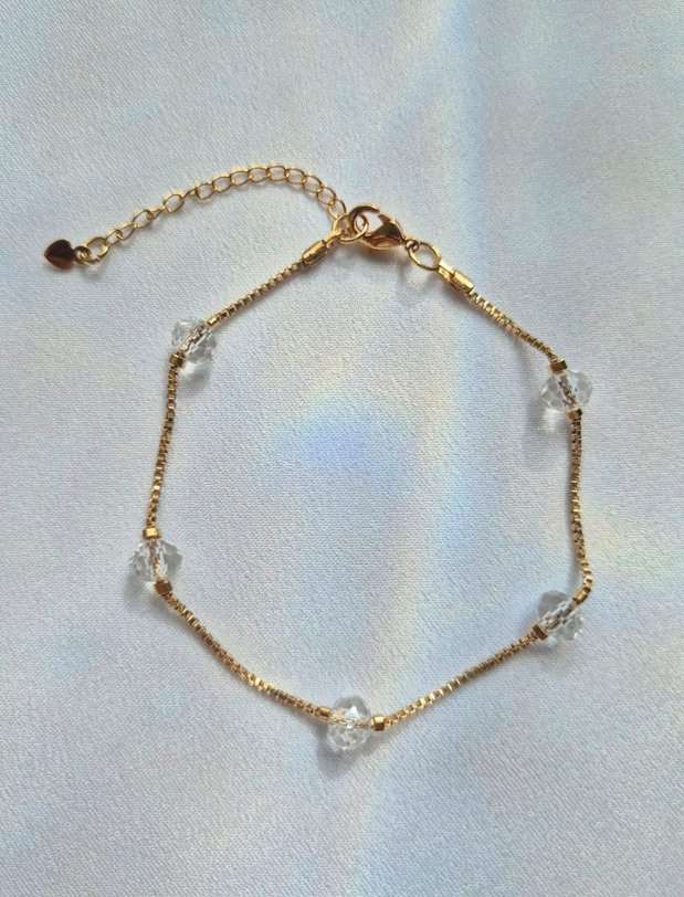 Pulseira cristais transparentes banhada a ouro 18k