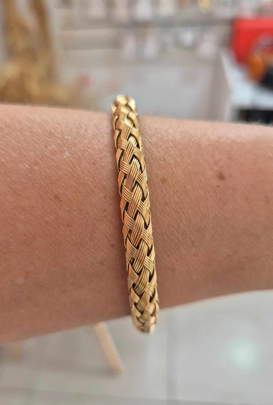Bracelete trançado aço dourado