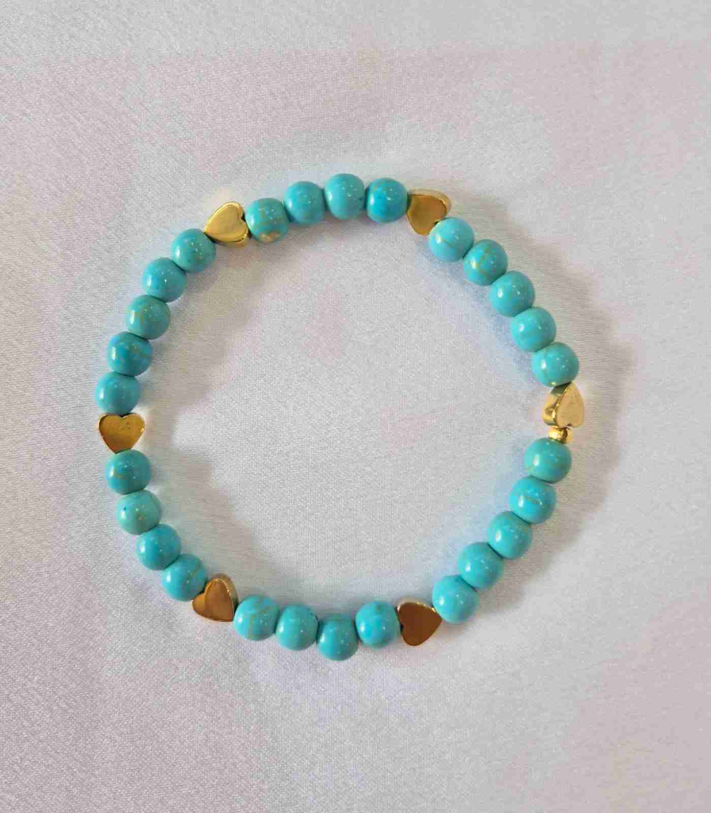 Pulseira howlita turquesa e hematitas corações