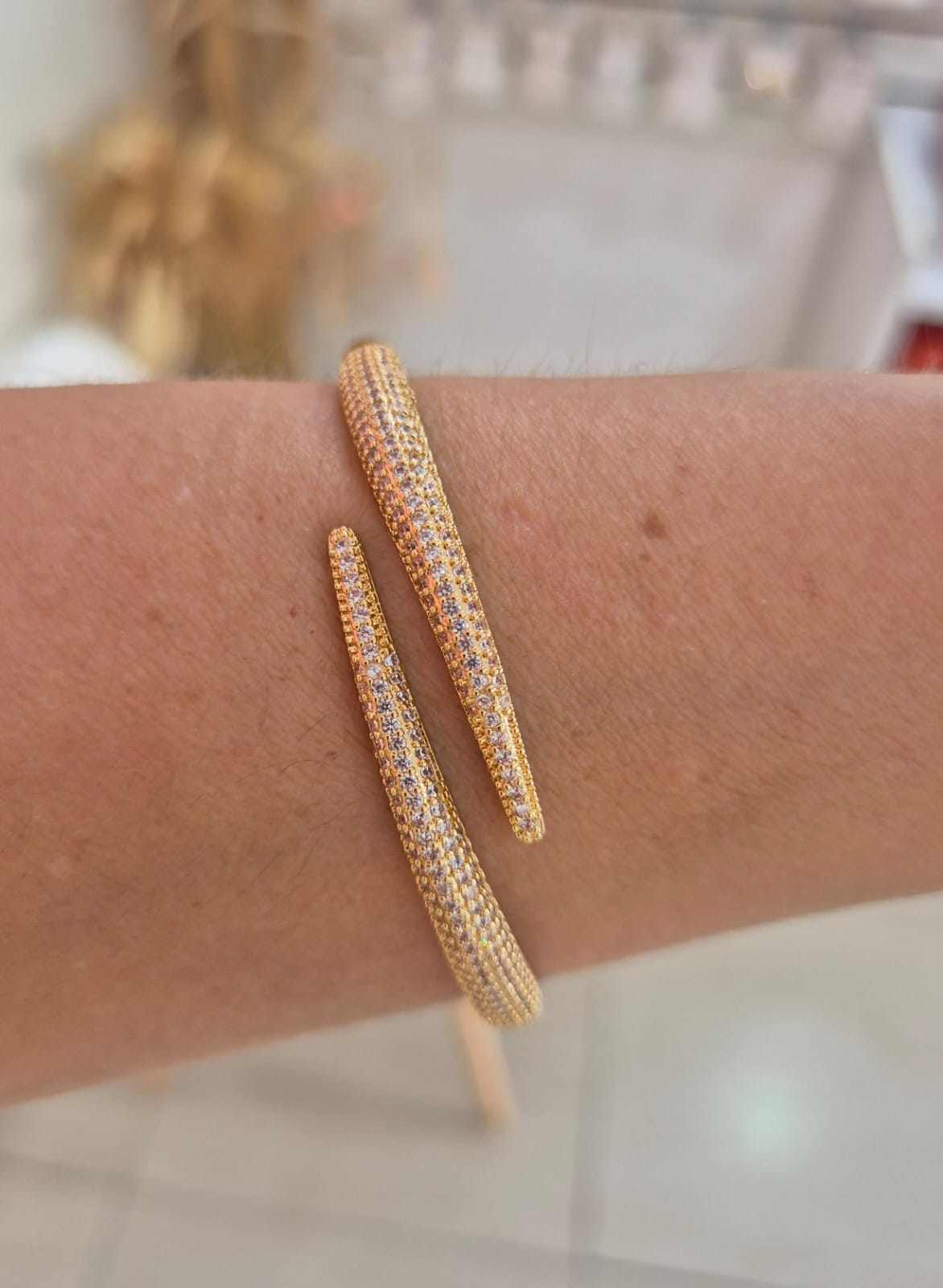 Bracelete pontas cravejado dourado