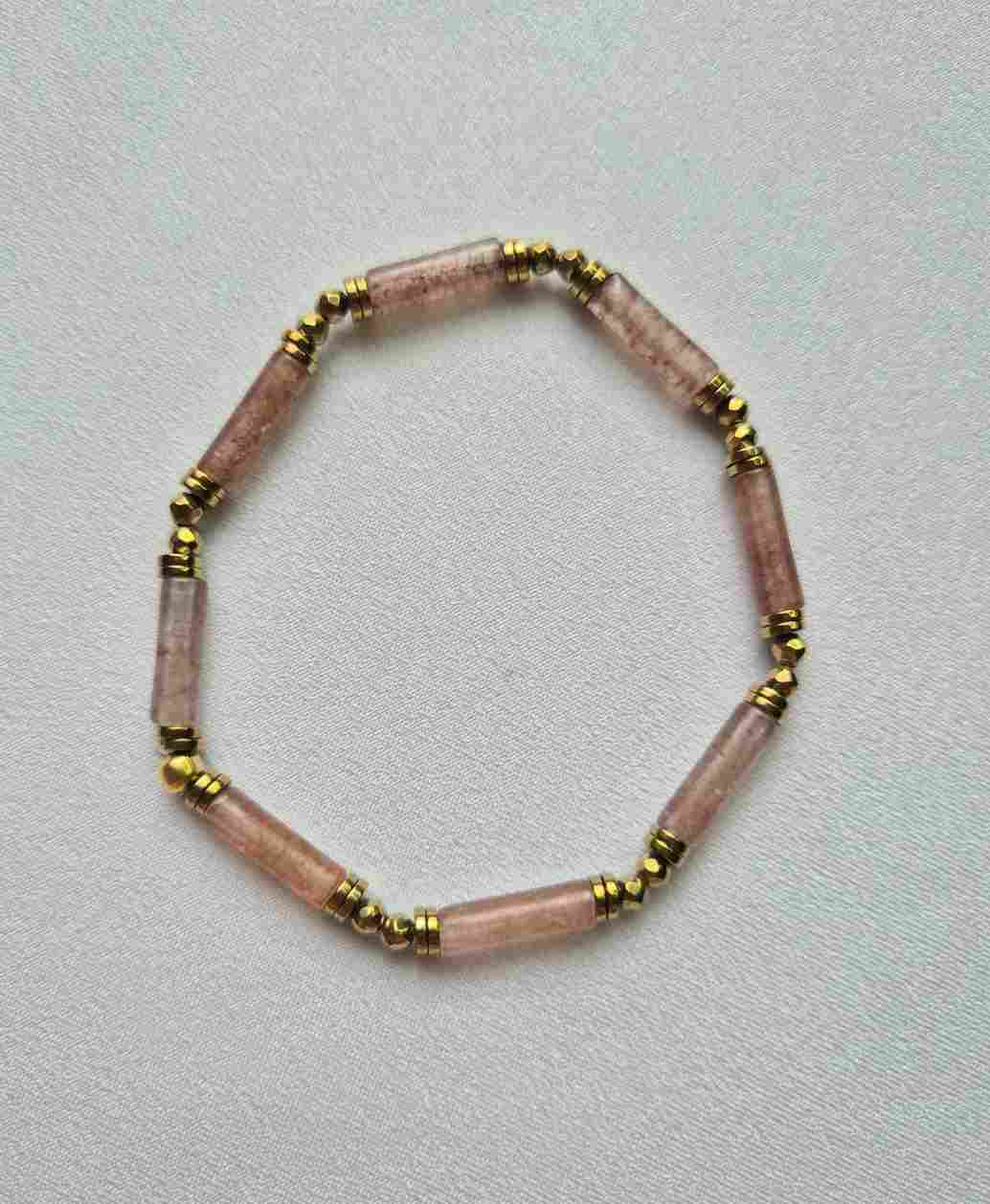 Pulseira quartzo morango e hematitas douradas